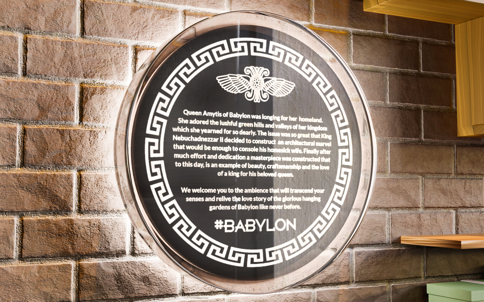 Round Babylon wall sign mounted on a brick wall