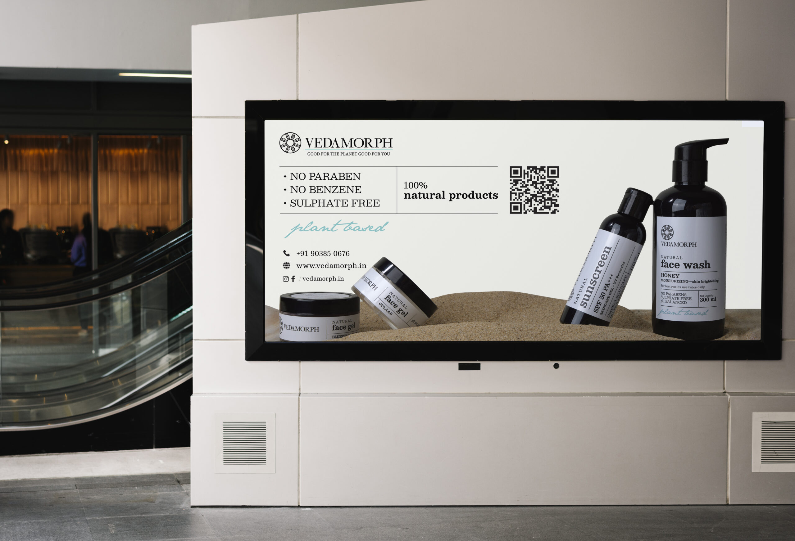 Vedamorph product advertisement displayed beside a shopping centre escalator